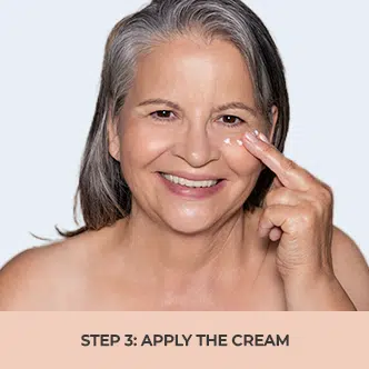 woman apply cream with finger